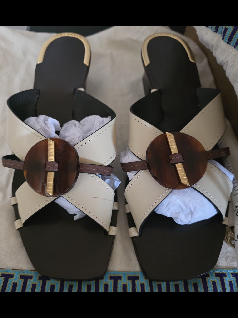 Tory Burch Cream Cross-Strap Slide Mules with Brown Medallion & Gold Accent